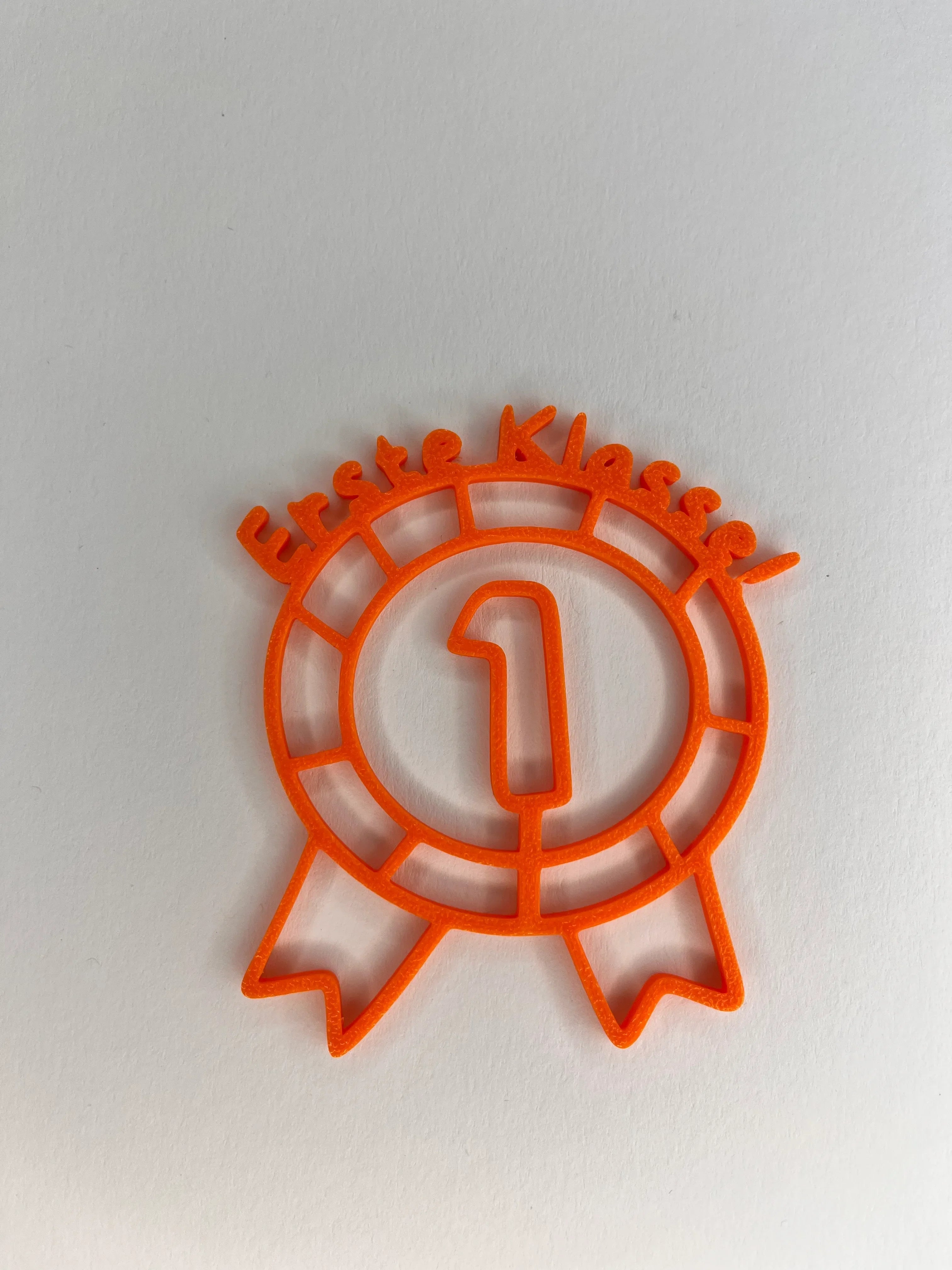 Muffin-Topper „Erste Klasse!“ Orange